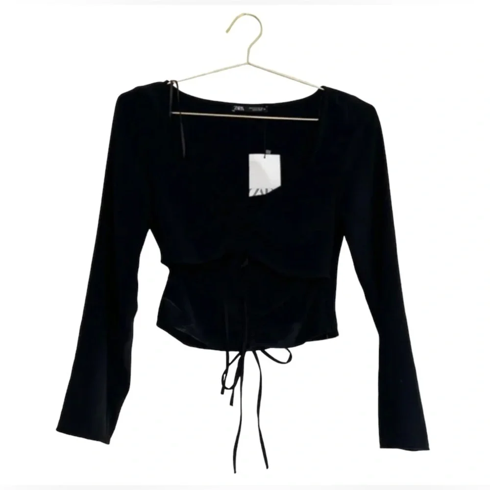 Zara Ruched Cut Out Long Sleeve Top in Black